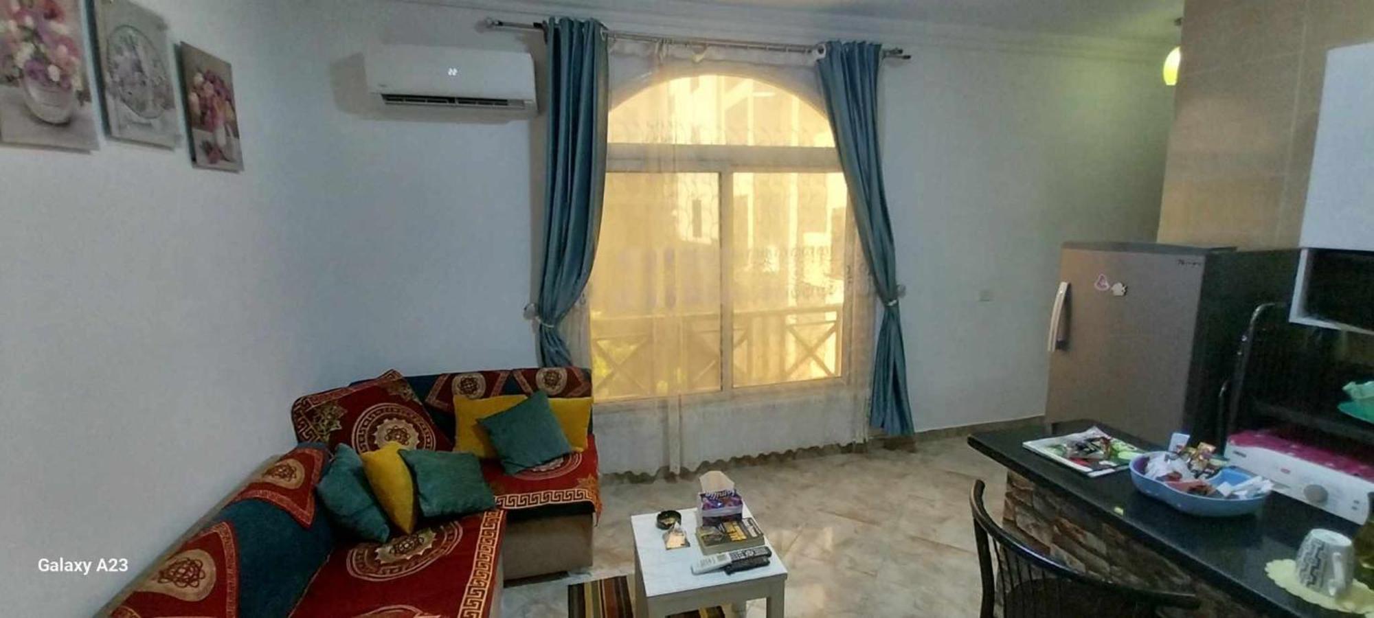 Апартаменты Cozy Хургада Номер фото